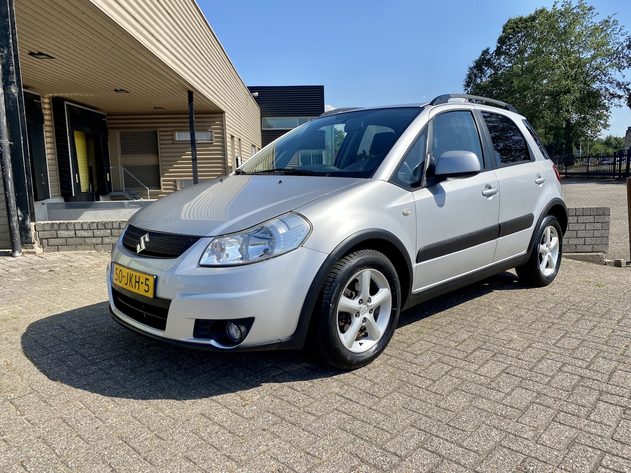 Suzuki SX4 - 1.6 Shogun [ 1e eig,airco,audio,lmv ] - AutoWereld.nl