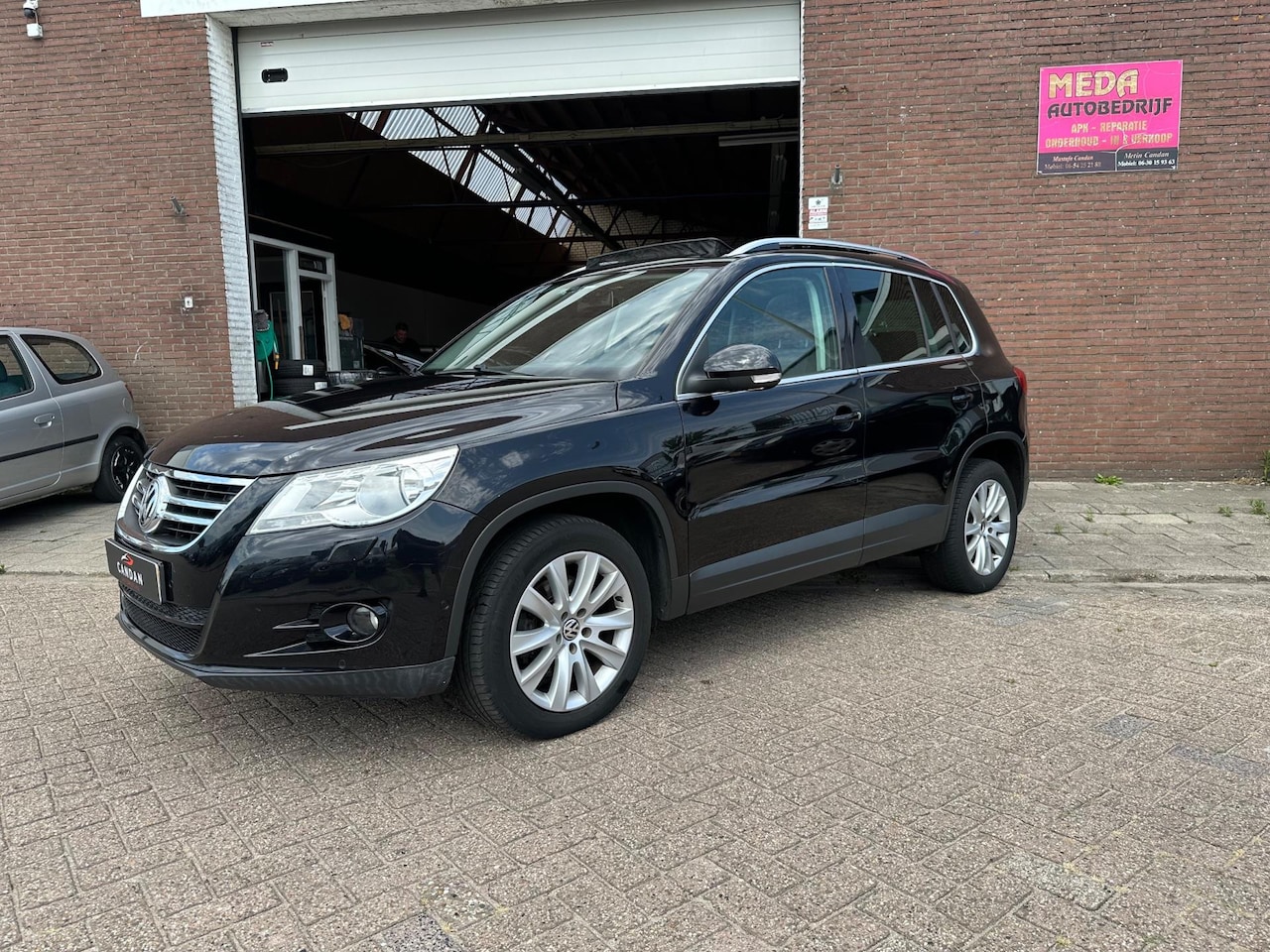 Volkswagen Tiguan - 1.4 TSI Comfort&Design 4Motion | Airco | Panoramadak - AutoWereld.nl