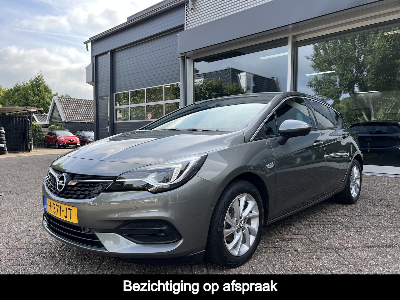 Opel Astra - 1.2 Elegance Trekhaak, Cruise, Camera, Stoelverwarming, Carplay. - AutoWereld.nl