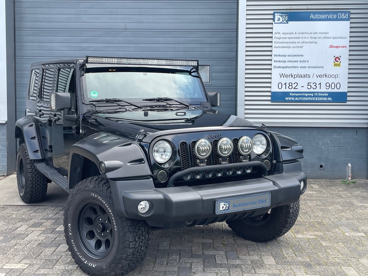 Jeep Wrangler Unlimited - 2.8 CRD Sahara|2011|Cruise|Verhoogd|Leder|Stoelv.| - AutoWereld.nl