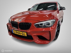 BMW 1-serie - M140i xDrive/Cruise/Clima/Camera/PDC/Navi/454pk