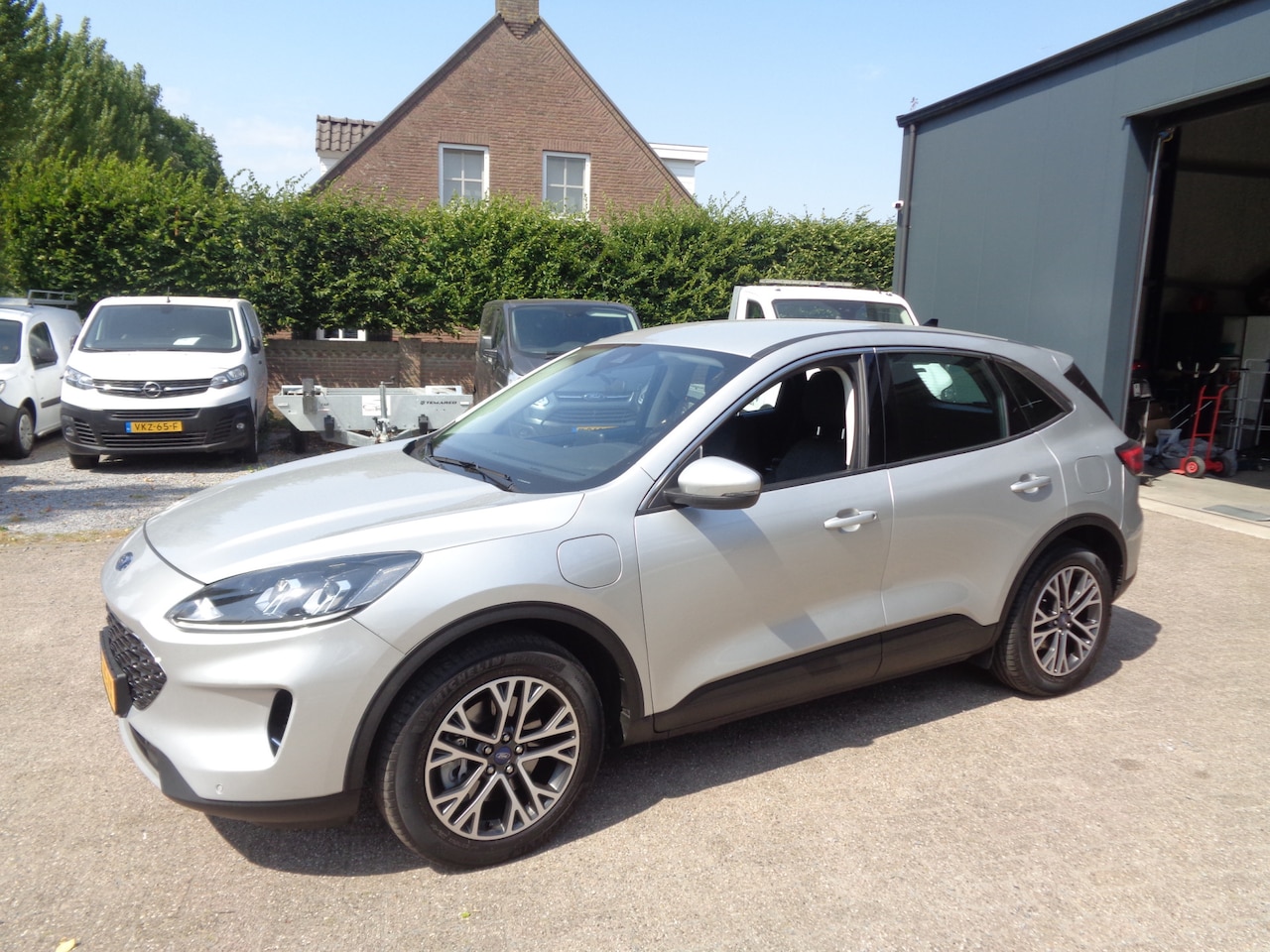 Ford Kuga - 2.5 PHEV Trend Ecc, LM velgen, Navigatie, Cruise, Camera - AutoWereld.nl
