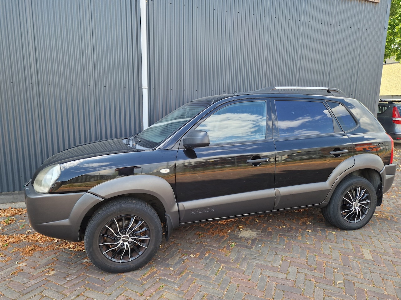 Hyundai Tucson - 2.0i Active climatronic trekhaak - AutoWereld.nl
