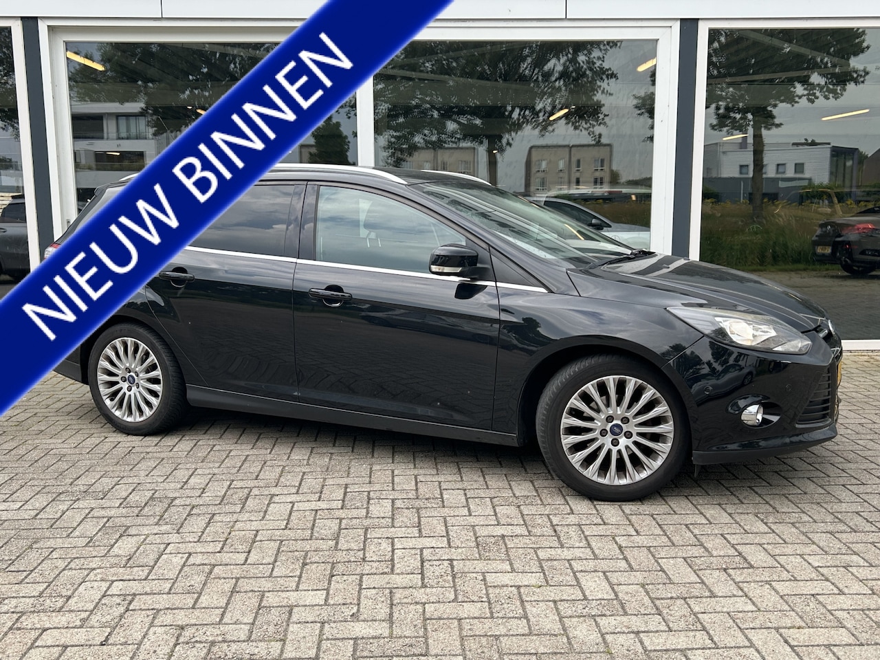 Ford Focus Wagon - 1.6 TI-VCT Titanium 50% deal 3.225,- ACTIE Stoel verwarming / Trekhaak / Cruise / LMV - AutoWereld.nl