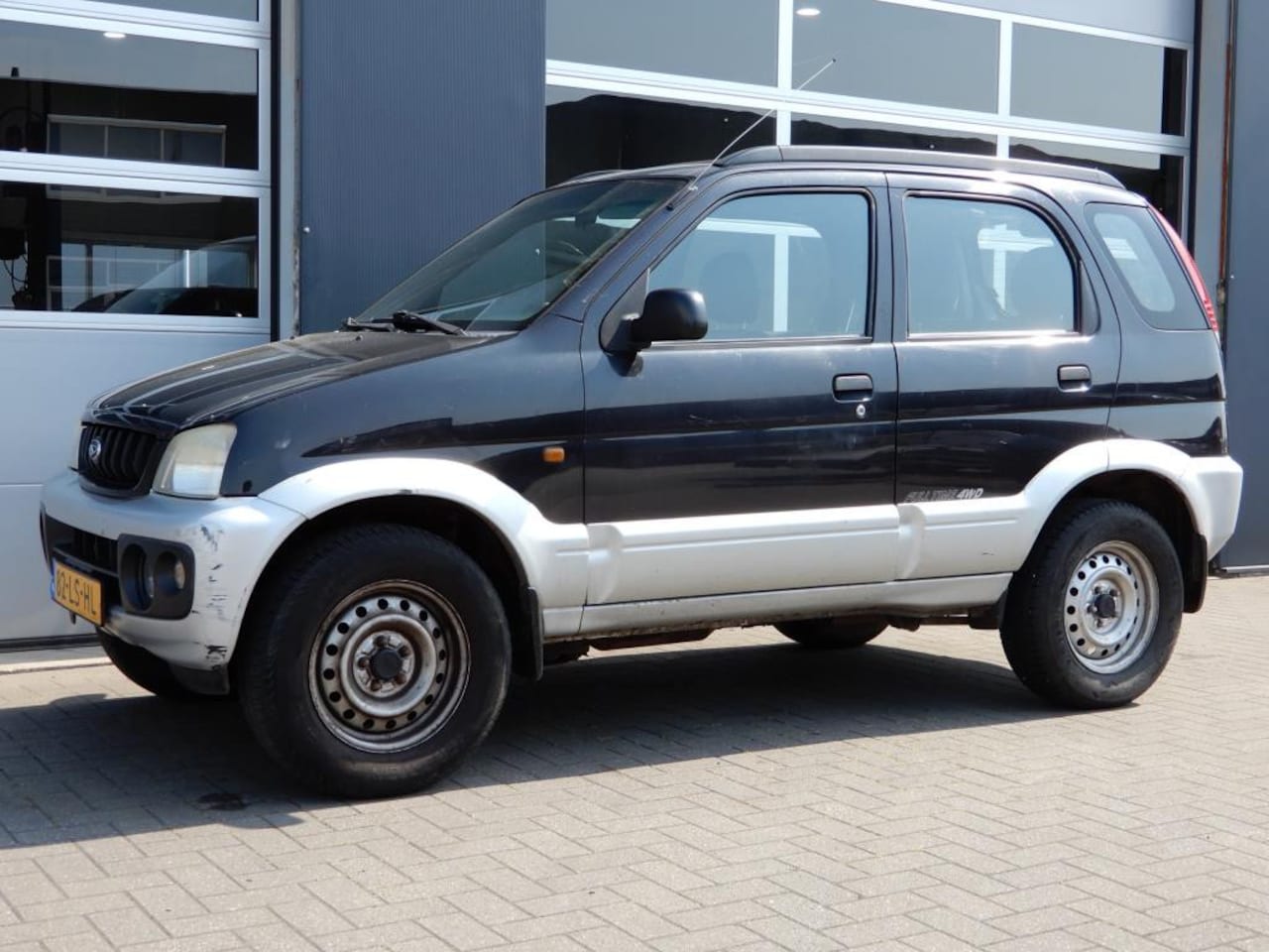 Daihatsu Terios - 1.3 4WD SXE Automaat/Airco/CV - AutoWereld.nl