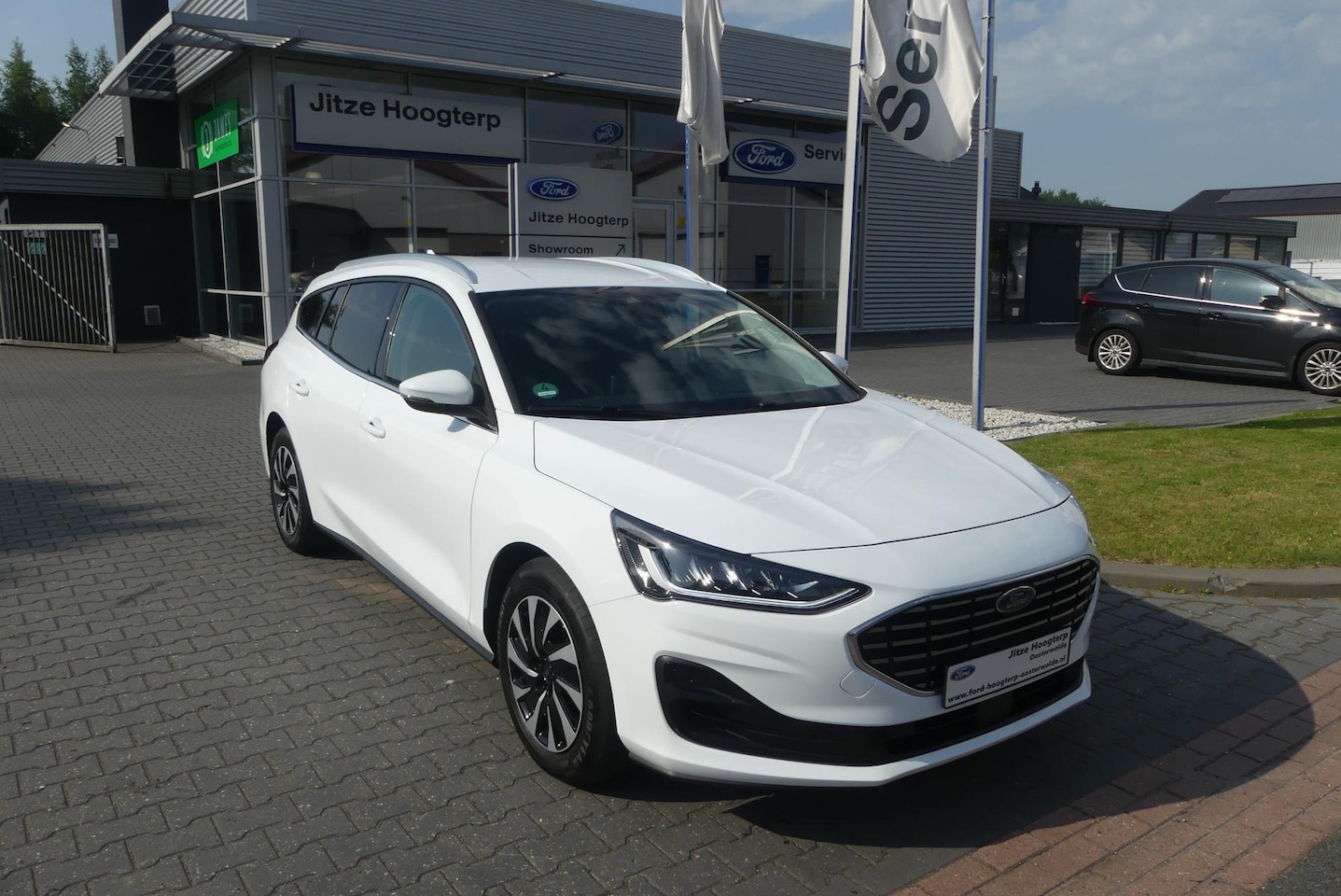 Ford Focus Wagon - 1.0 EcoBoost Hybrid Titanium CRUISE, CLIMA, NAVI, STOEL/STUURVERWARMING, PDC V&A, 36.013KM - AutoWereld.nl