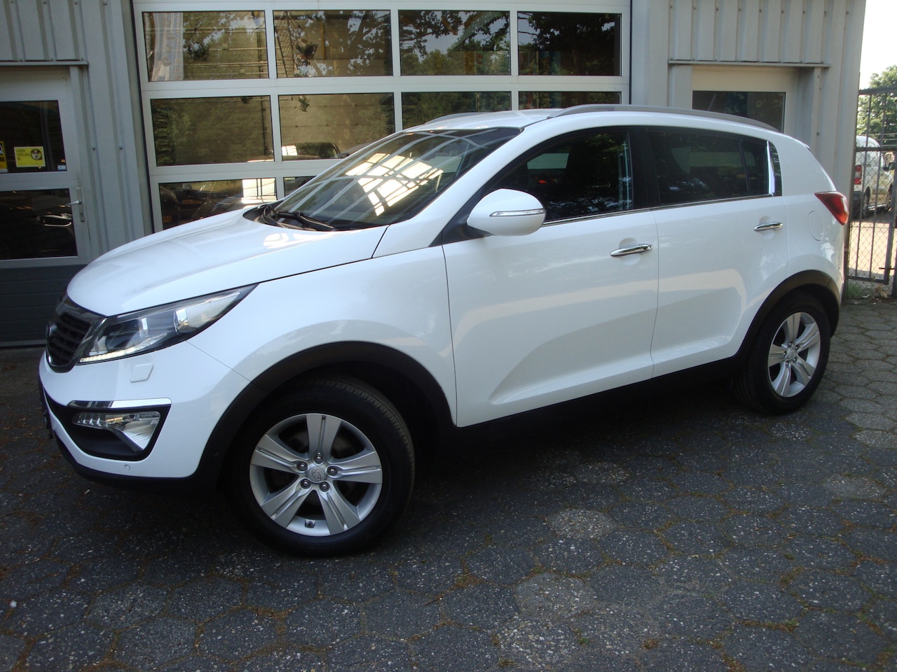 Kia Sportage - 1.6 GDI BusinessPlusLine / Trekhaak/ lederen bekleding - AutoWereld.nl