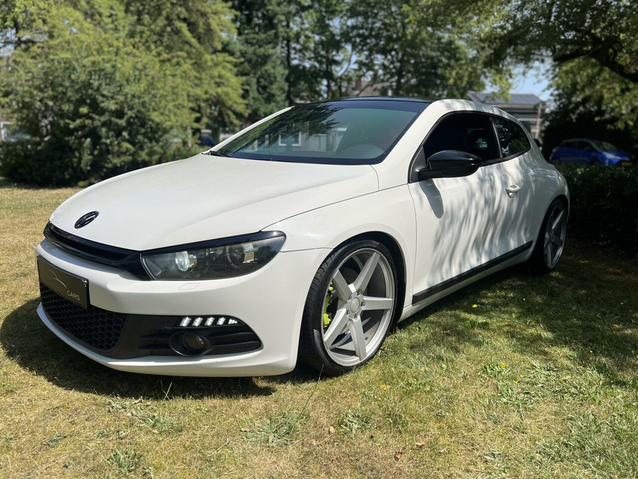 Volkswagen Scirocco - 2.0 TSI custom uitlaat Apple CarPlay - AutoWereld.nl
