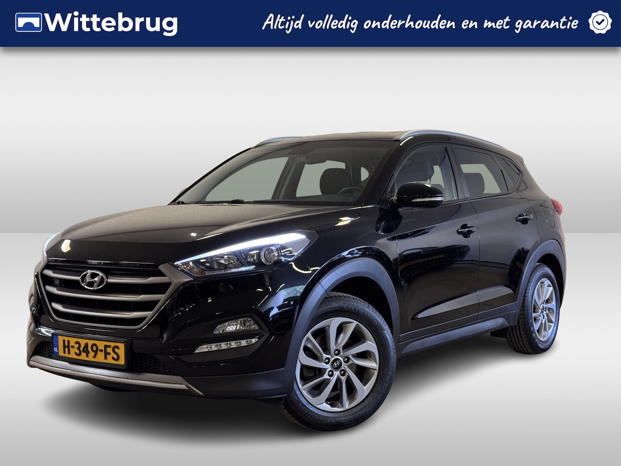 Hyundai Tucson - 1.6 GDi Comfort Parkeersensoren, achteruitrijcamera & trekhaak!! - AutoWereld.nl