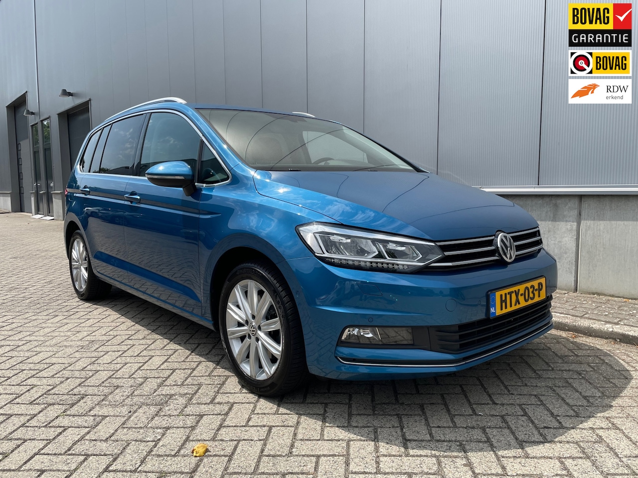 Volkswagen Touran - 1.5 TSI Highline Business R / Camera / Trekhaak - AutoWereld.nl
