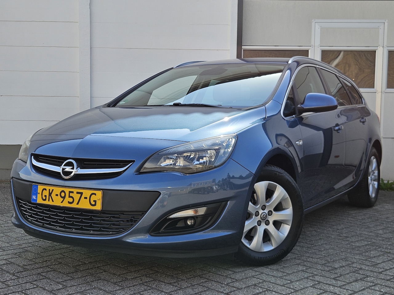 Opel Astra Sports Tourer - 1.4 Turbo Edition /Cruise/Airco/Trekhaak/PDC! - AutoWereld.nl