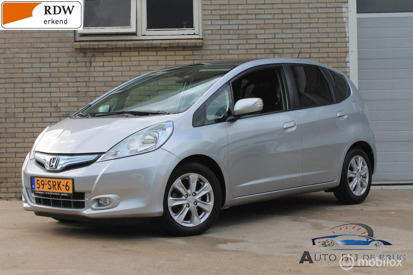 Honda Jazz - 1.4 Hybrid Elegance Airco Navi Clima - AutoWereld.nl