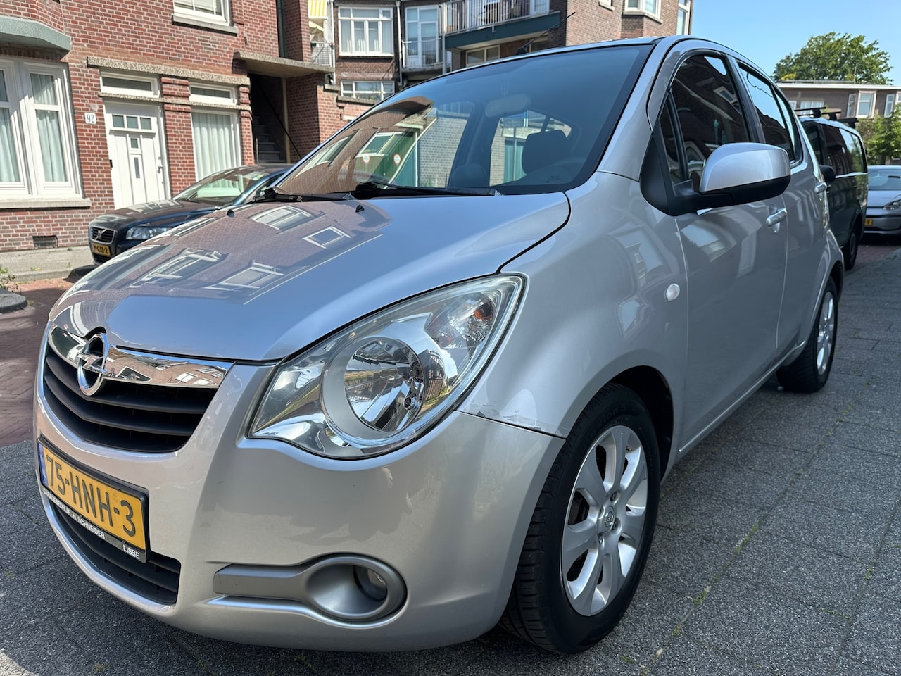 Opel Agila - 1.2 Enjoy AUTOMAAT Airco Bluetooth Nieuwe Apk Sensoren Achter - AutoWereld.nl