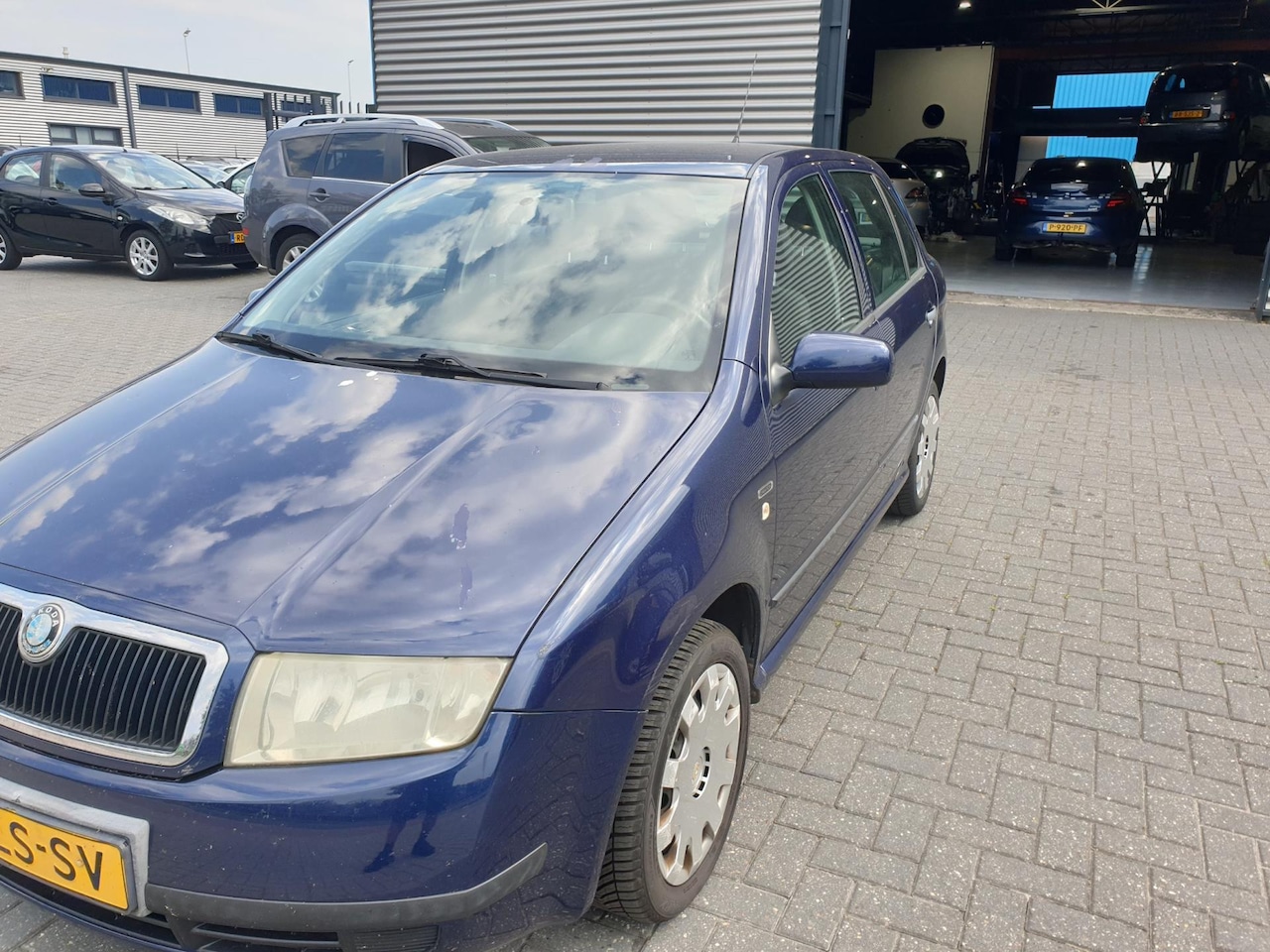 Skoda Fabia - 1.4-16V Creation 1.4-16V Creation - AutoWereld.nl