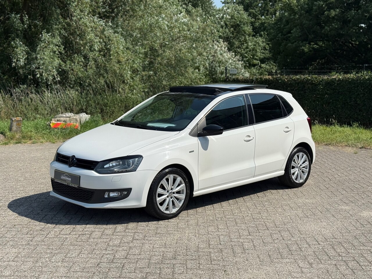 Volkswagen Polo - 1.2 TSI BlueMotion Highline PANO I LED I PDC I CRUISE I MOOI - AutoWereld.nl