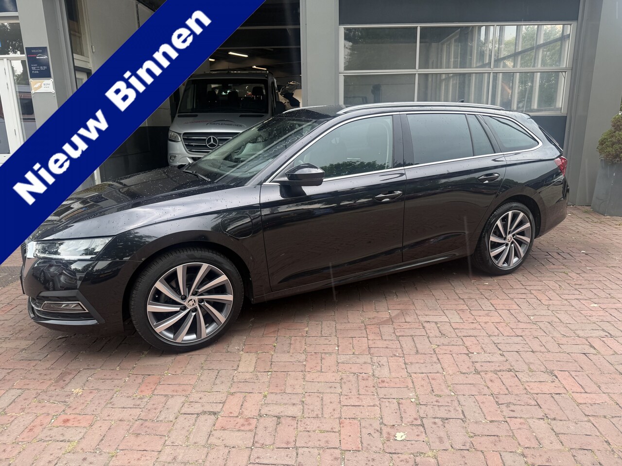 Skoda Octavia Combi - 1.4 TSI iV PHEV Sportline Business 07-2021 72.389 KM - AutoWereld.nl