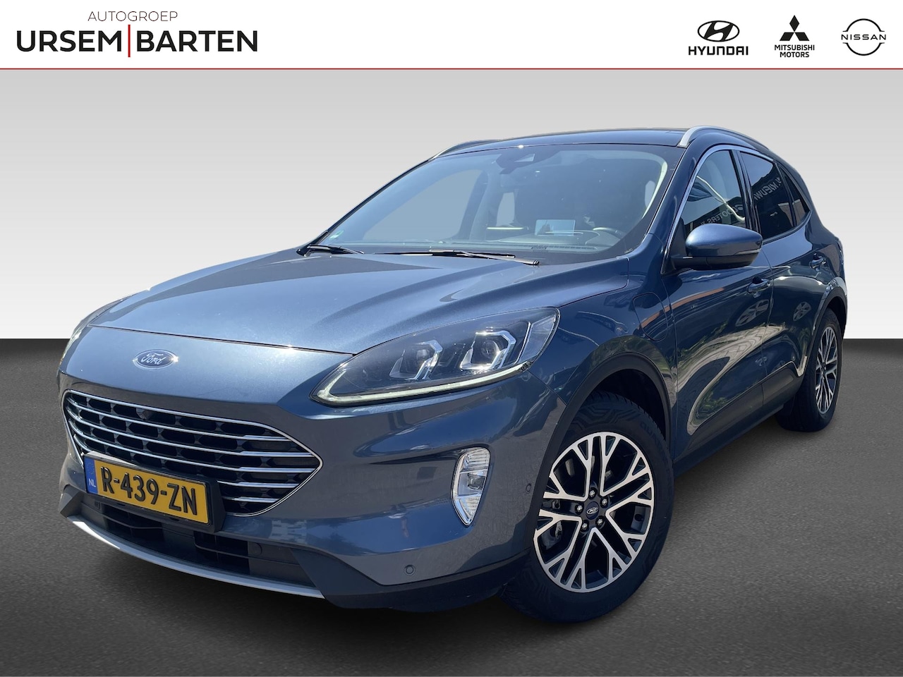 Ford Kuga - 2.5 PHEV Titanium | schuifdak | Bang & Olufsen | head-up display | stoelverwarming | halfl - AutoWereld.nl