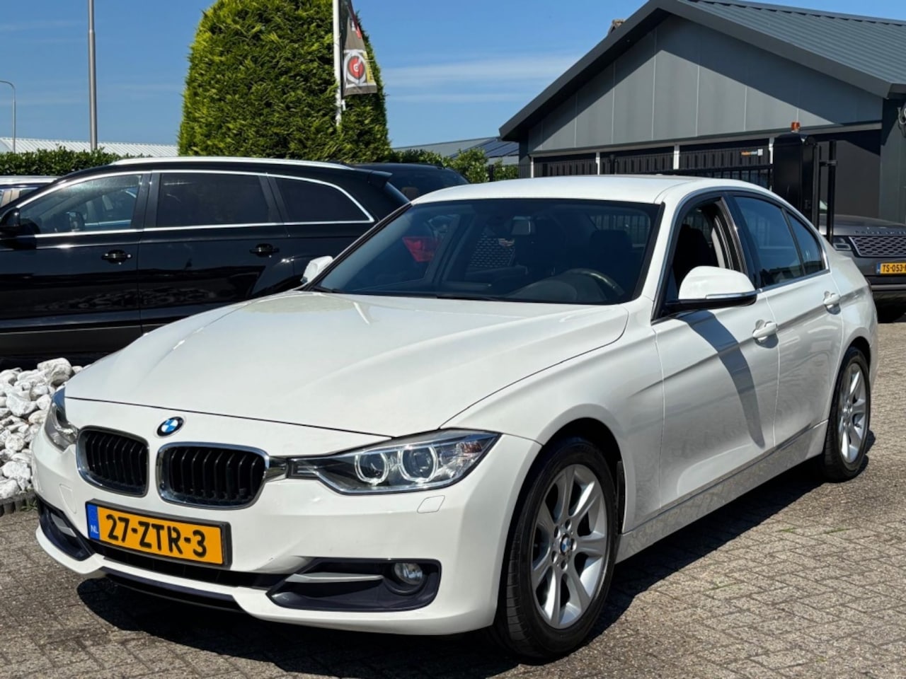 BMW 3-serie - 320i Sedan HIgh Exe Sport 2013 NL Auto Wit - AutoWereld.nl