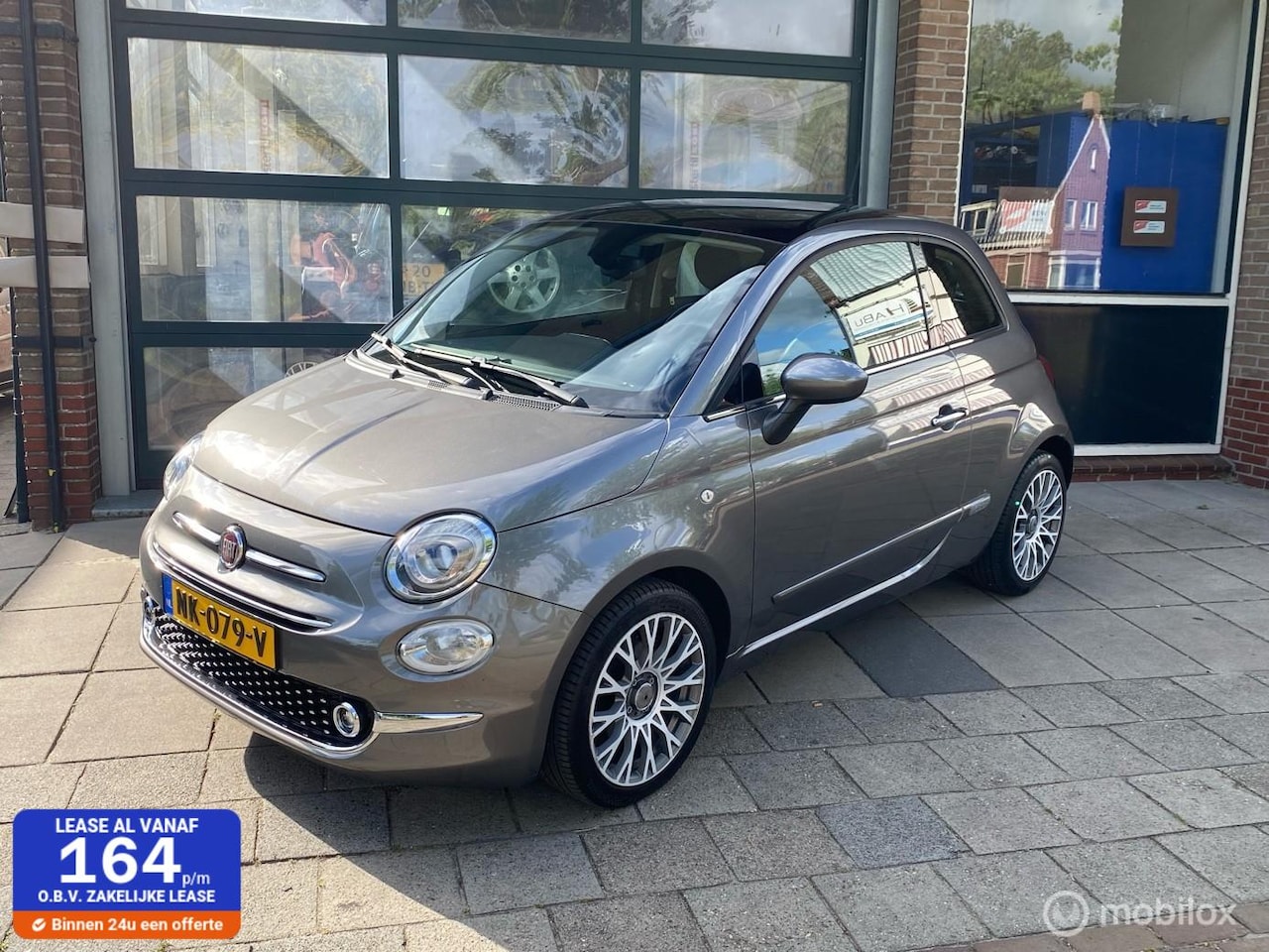 Fiat 500 - 0.9 TwinAir Turbo Lounge / Panoramadak / Navi / cruise / - AutoWereld.nl