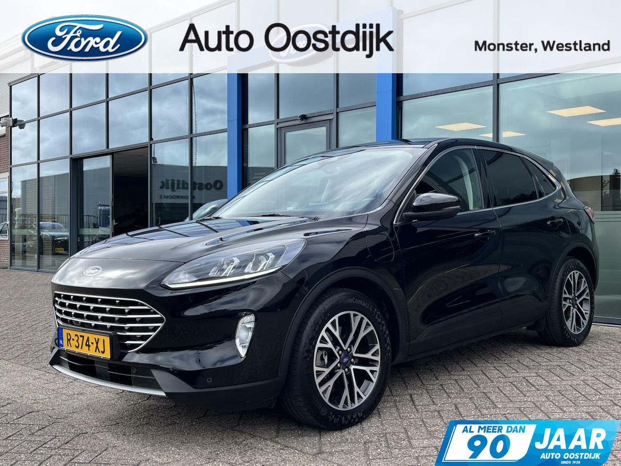 Ford Kuga - 2.5 PHEV Titanium 225PK Winterpack Climate Cruise Parkeersensoren Privacy Glass Navi Carpl - AutoWereld.nl