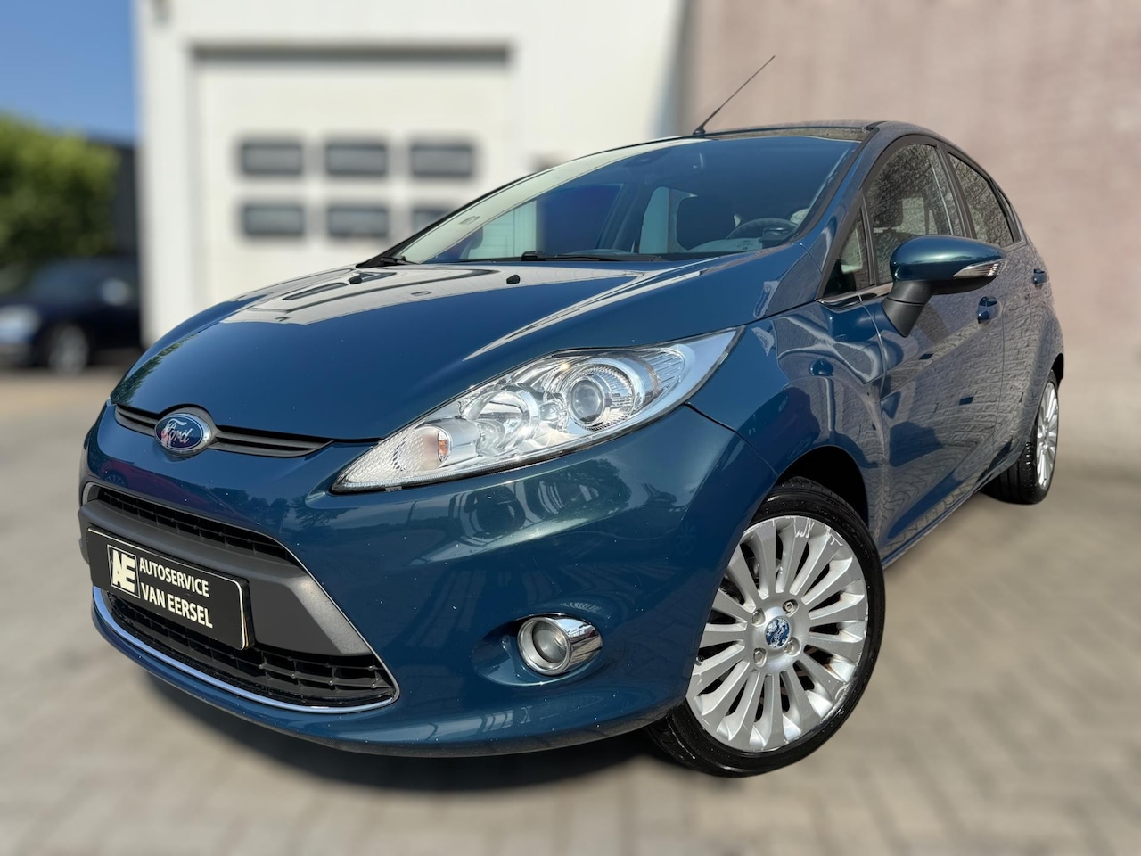 Ford Fiesta - 1.4 Titanium PDC / ECC / VERWARMDE VOORRUIT / NL AUTO / ELEK INKLAPB SPIEGELS / AIRCO / LM - AutoWereld.nl