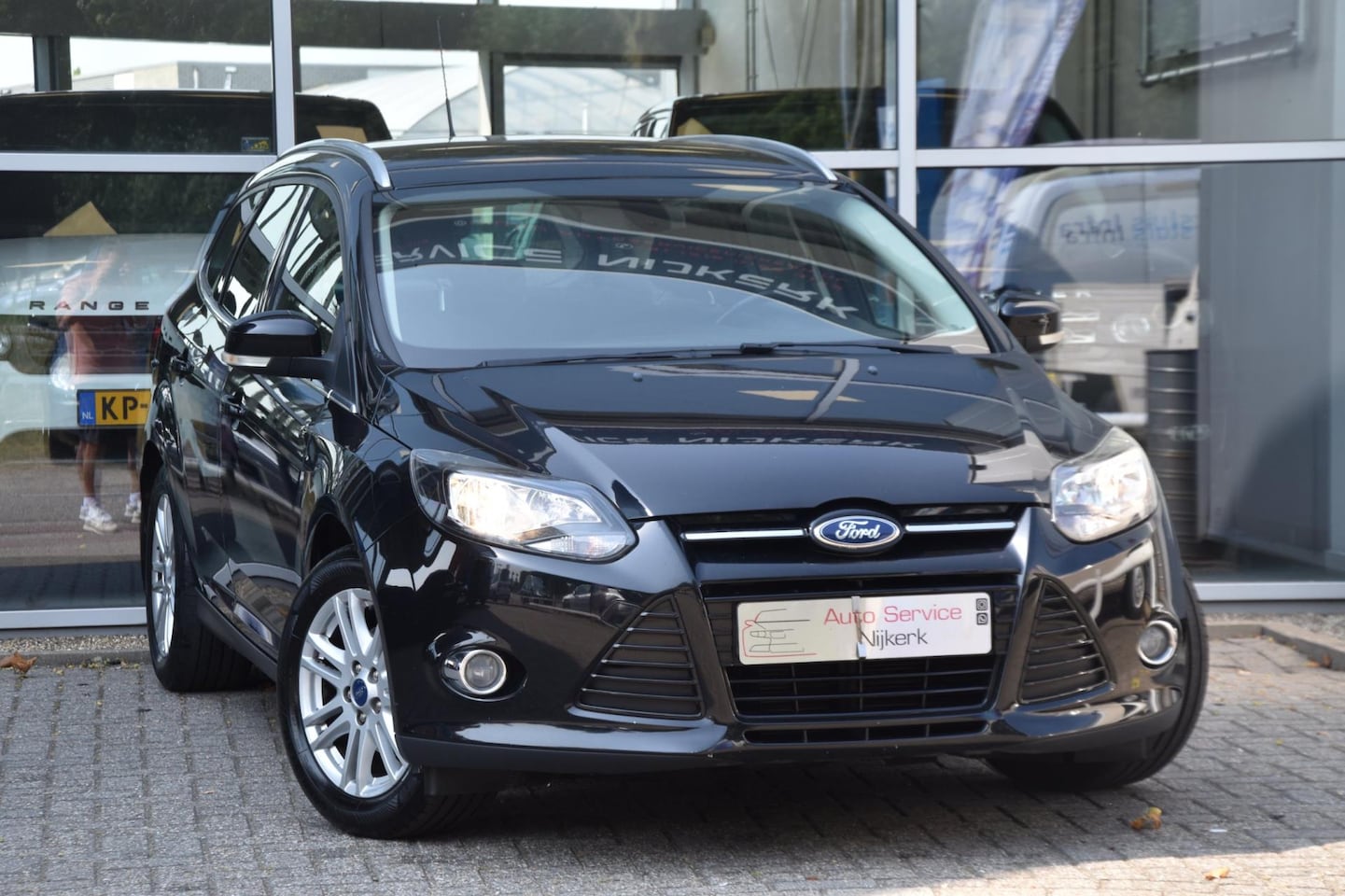 Ford Focus Wagon - 1.0 EcoBoost Titanium airco Navi. Pdc Trekhaak 1ste Eigenaar - AutoWereld.nl
