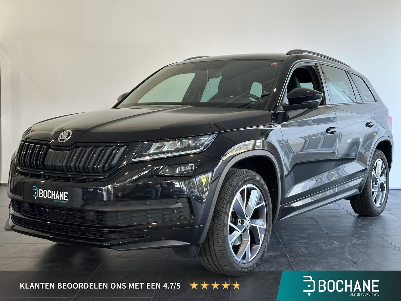 Skoda Kodiaq - 1.5 TSI Sportline Business AUTOMAAT | TREKHAAK | NAVIGATIE | ACHTERUITRIJCAMERA - AutoWereld.nl