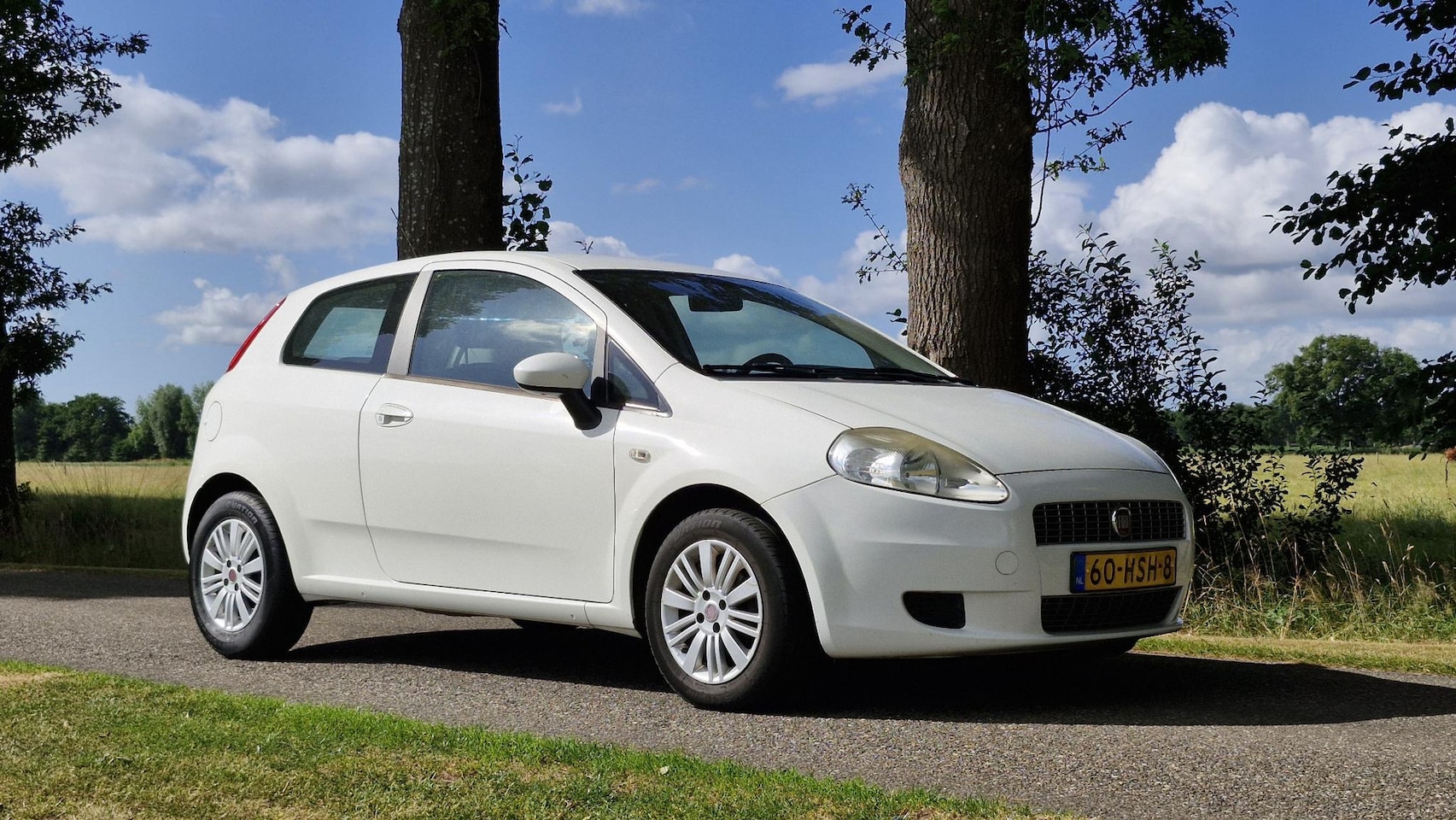 Fiat Grande Punto - 1.2 Edizione Lusso 1.2 Edizione Lusso (Airco / APK maart 2026 / Airco) - AutoWereld.nl