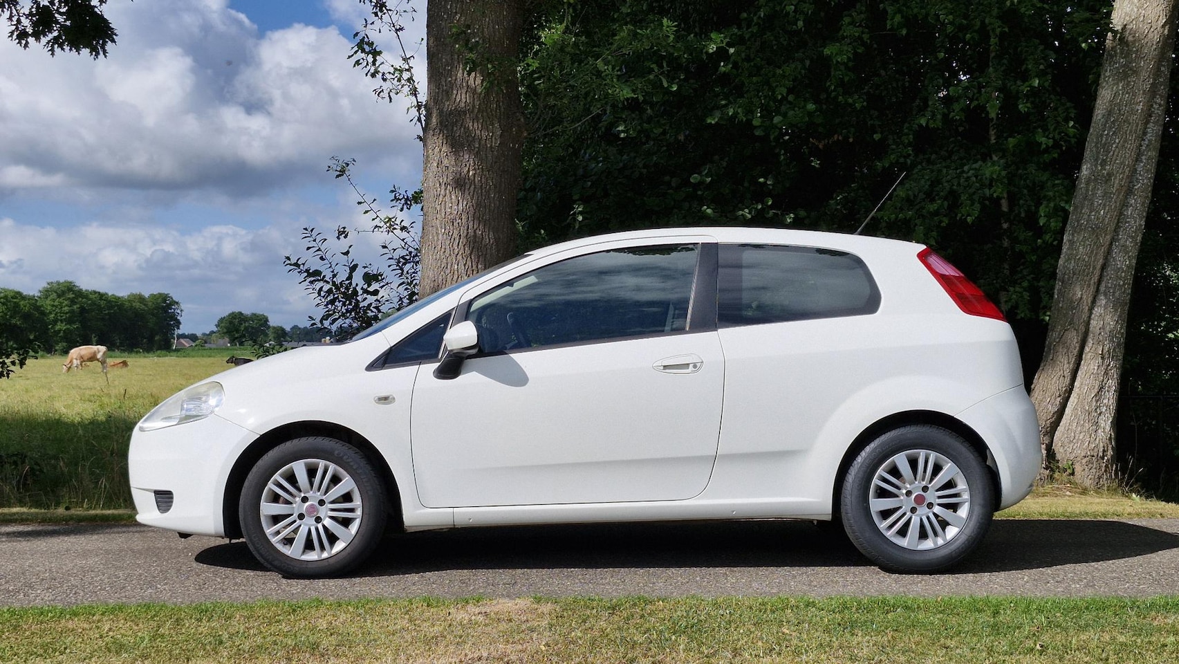 Fiat Grande Punto - 1.2 Edizione Lusso 1.2 Edizione Lusso (Airco / APK maart 2026 / Airco)