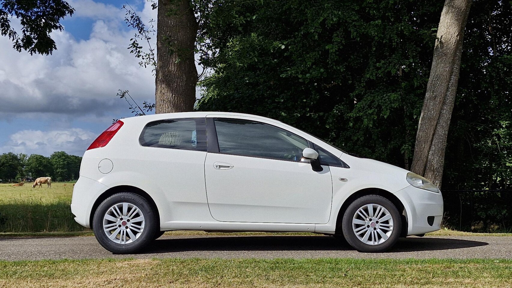 Fiat Grande Punto - 1.2 Edizione Lusso 1.2 Edizione Lusso (Airco / APK maart 2026 / Airco)