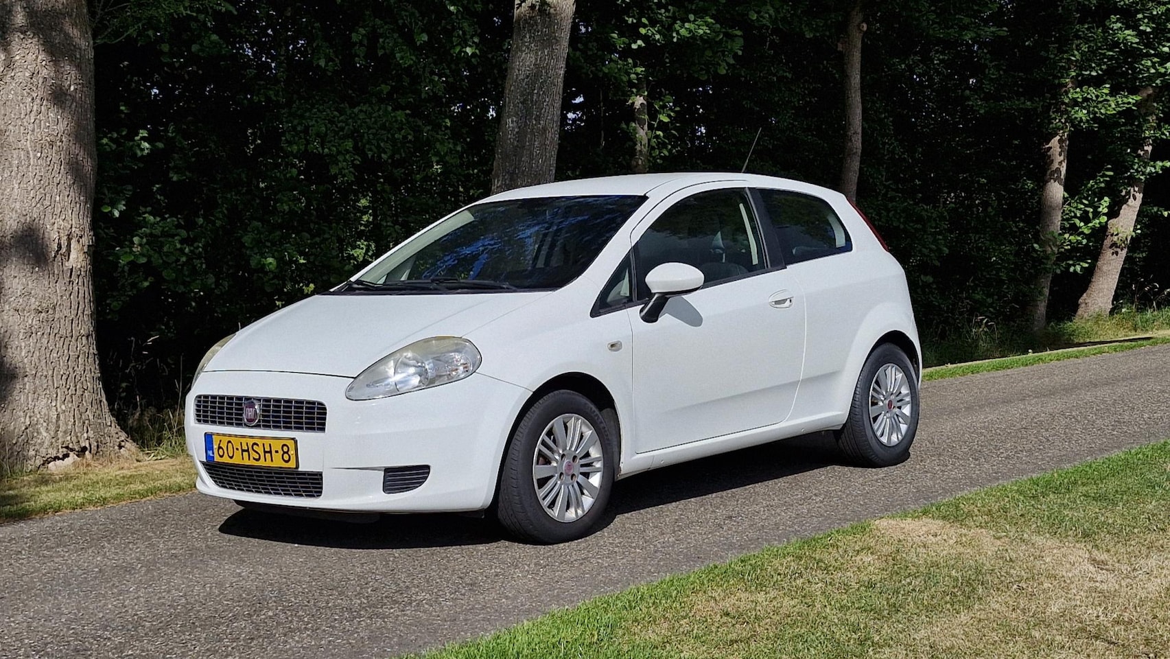 Fiat Grande Punto - 1.2 Edizione Lusso 1.2 Edizione Lusso (Airco / APK maart 2026 / Airco)