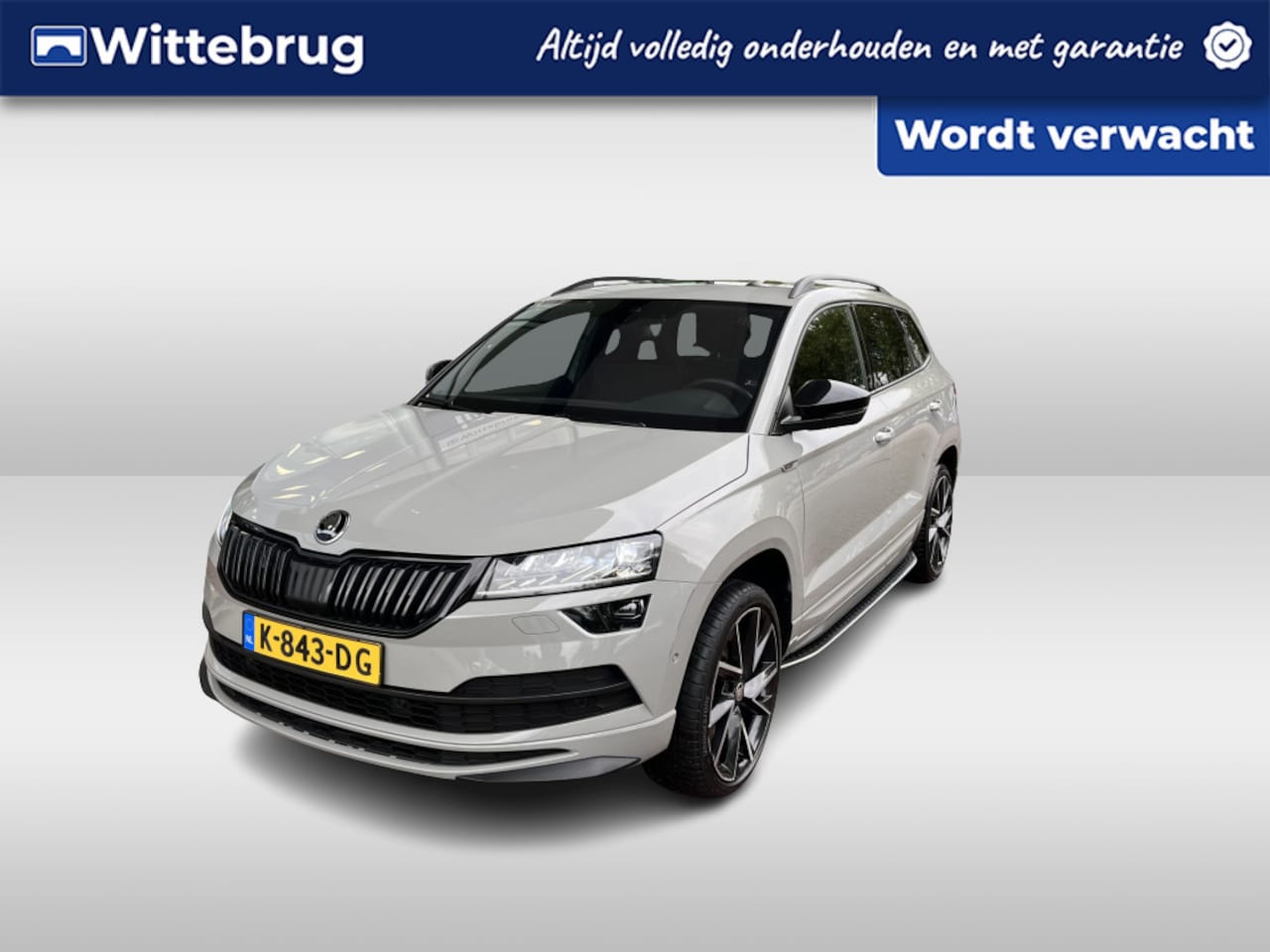 Skoda Karoq - 1.5 TSI ACT Sportline Business / Digitale Cockpit/ Pano/ Led/ Zwenkhaak/  Elec.K. / Camera - AutoWereld.nl