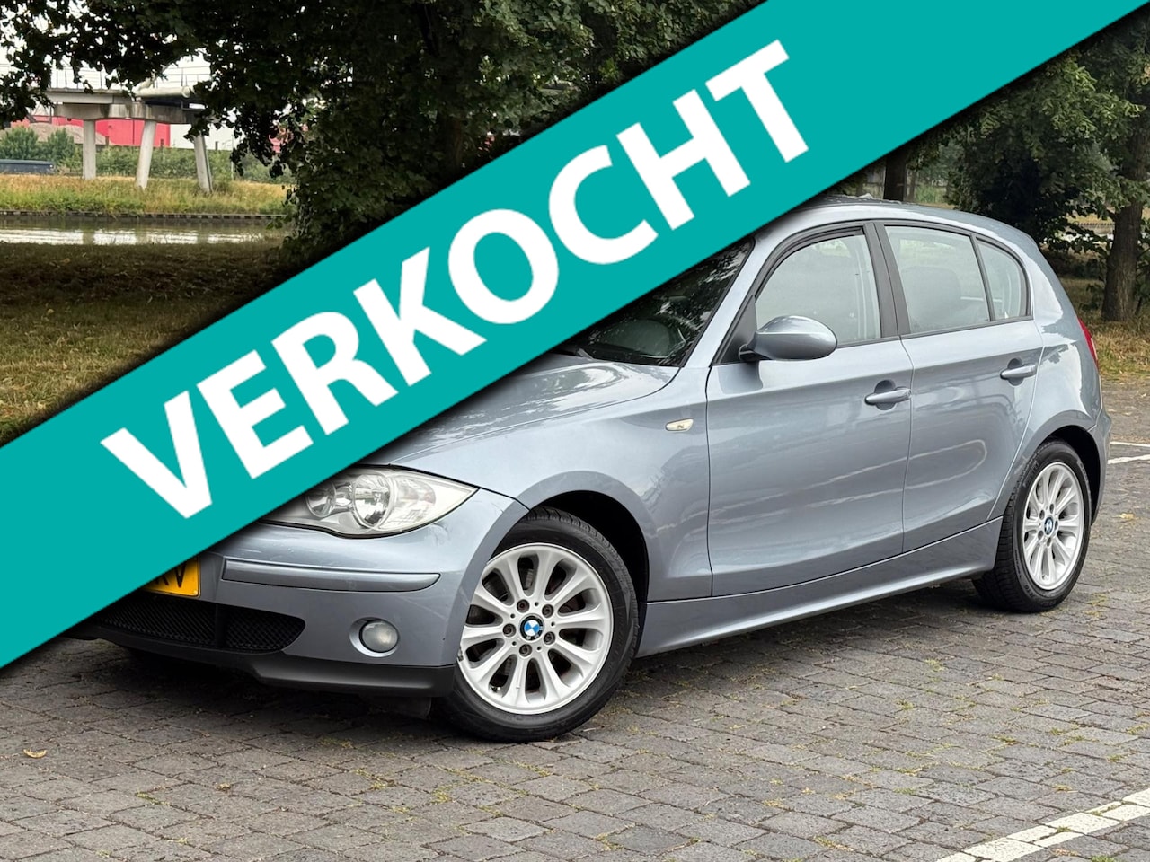 BMW 1-serie - 116i High Executive/Airco/Cruise/PDC/NAP/LMV - AutoWereld.nl