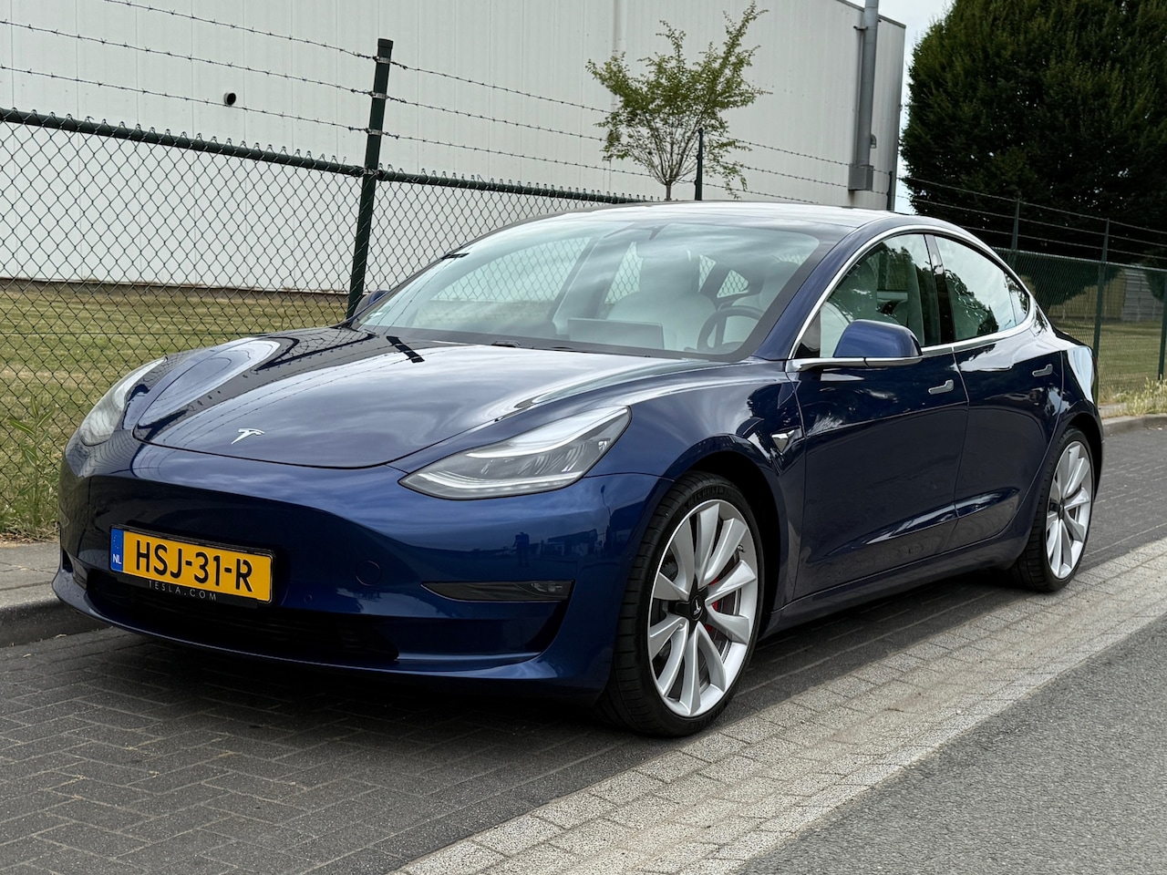 Tesla Model 3 - Performance AWD 75 kWh FSD Actief Wit leder - AutoWereld.nl