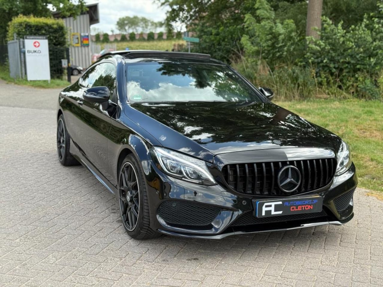 Mercedes-Benz C-klasse Coupé - 250 Premium Plus AMG|Panoramadak|Cruise|HUD|63 LOOK|Camera|PDC|(9G tronic| - AutoWereld.nl