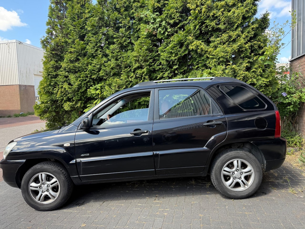 Kia Sportage - 2.7 V6 Adventure 4WD 2.7 V6 Adventure 4WD,Clima,PDC,Cruise control - AutoWereld.nl