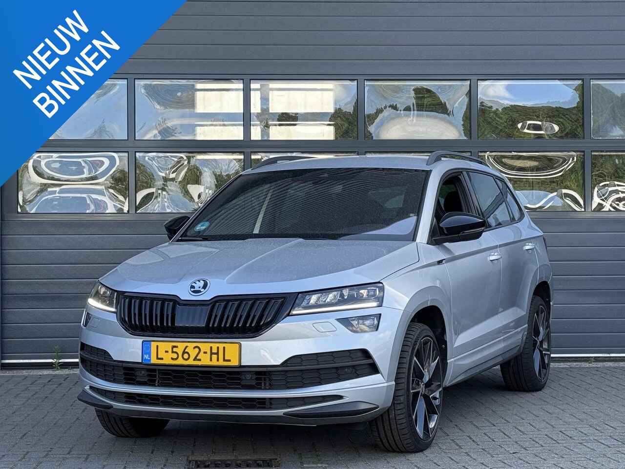 Skoda Karoq - 1.5 TSI ACT SPORTLINE BUSINESS I AUTOMAAT I ADAPTIVE CRUISE CONTROL I STOELVERWARMING I AP - AutoWereld.nl
