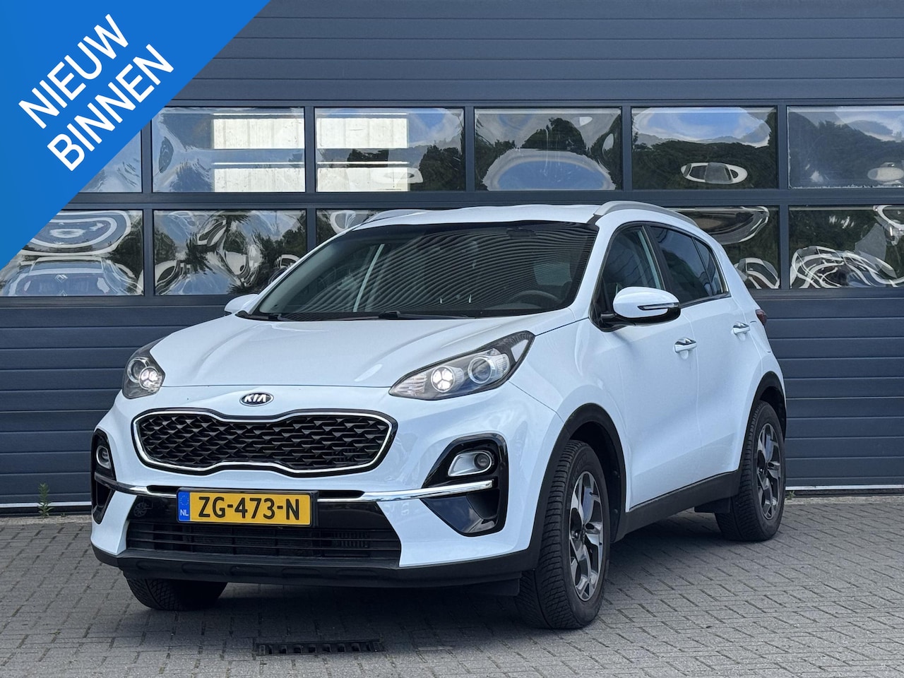 Kia Sportage - 1.6 T-GDI 4WD DYNAMICLINE I AUTOMAAT I TREKHAAK 1600KG I ACHTERUITRIJCAMERA I APPLE CARPLA - AutoWereld.nl