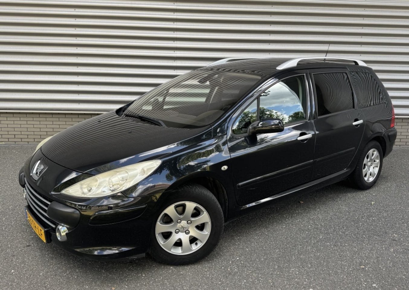 Peugeot 307 SW - 1.6-16V Premium PANO Clima - AutoWereld.nl