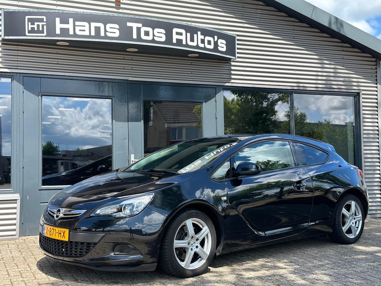 Opel Astra GTC - 1.4 / Cruise / 17"/ Donker glas - AutoWereld.nl
