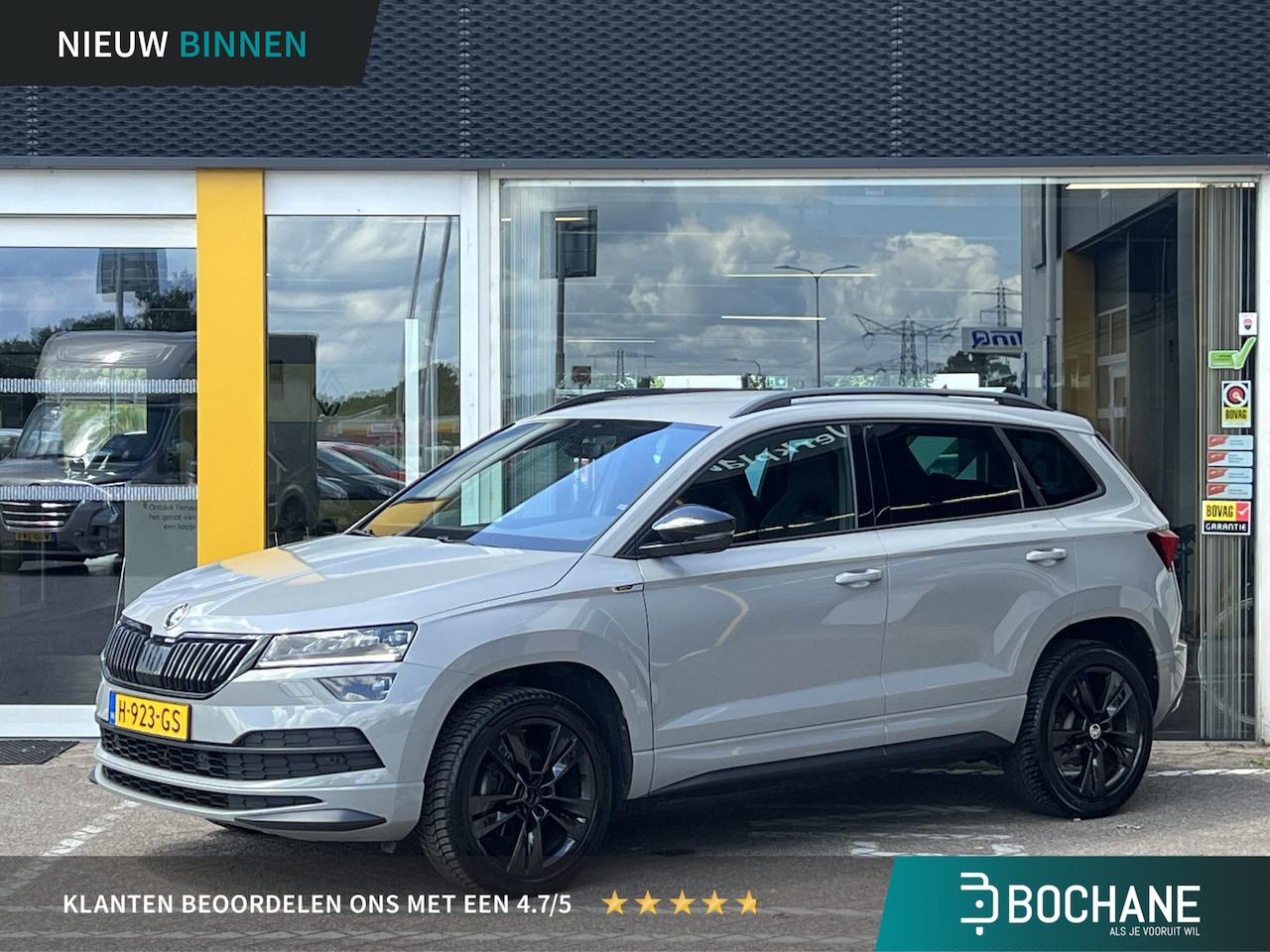 Skoda Karoq - 1.5 TSI ACT Sportline Business | Navigatie | Achteruitrijcamera | Key-less start | DAB | L - AutoWereld.nl