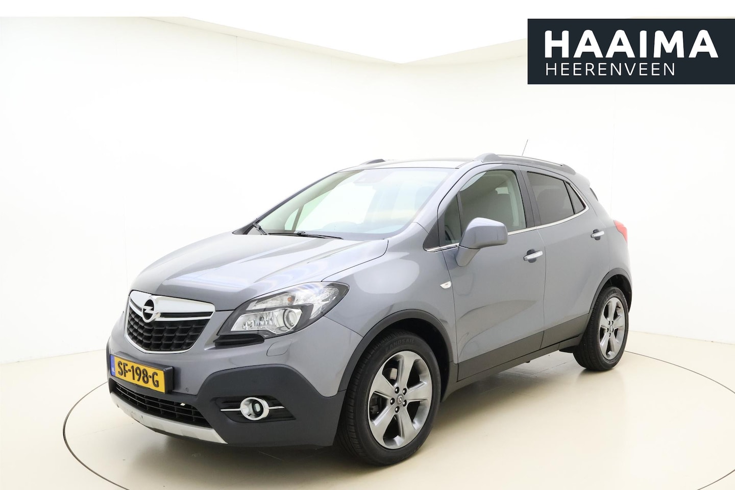 Opel Mokka - 1.4 T Cosmo 4x4 140 pk | Navigatie | Climate Control | Achteruitrijcamera | Half lederen b - AutoWereld.nl