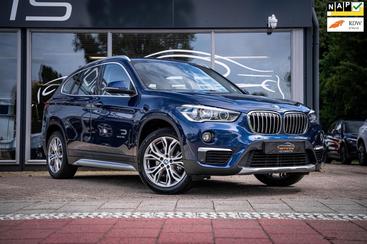 BMW X1 - SDrive18i Executive |Navi|Cruise|18"LMV|Camera - AutoWereld.nl