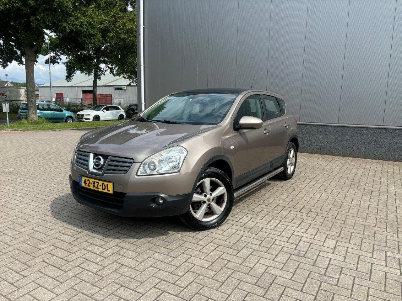 Nissan Qashqai - 2.0 Tekna Pack AIRCO/CRUISE/PANO DAK - AutoWereld.nl