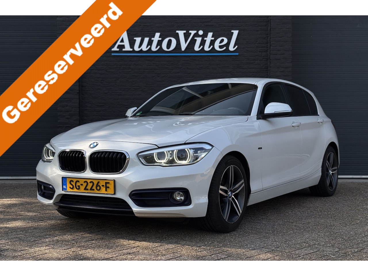 BMW 1-serie - 116d EDE Sportline | Sportstoelen | PDC Achter | LED | NAVI | VASTE HANDELSPRIJS - AutoWereld.nl