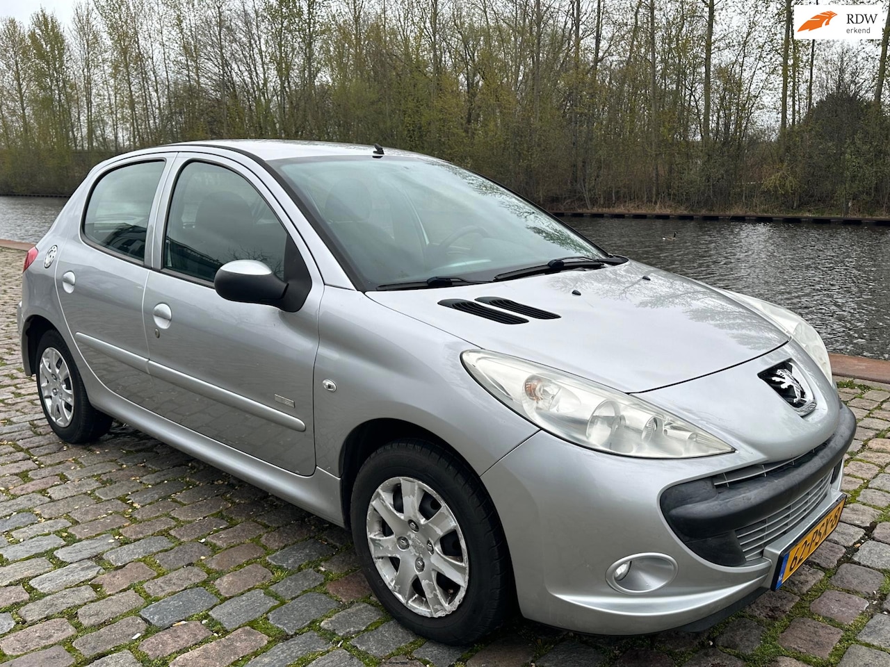 Peugeot 206 - 1.4 Millesim 200 elektrische ramen airco - AutoWereld.nl
