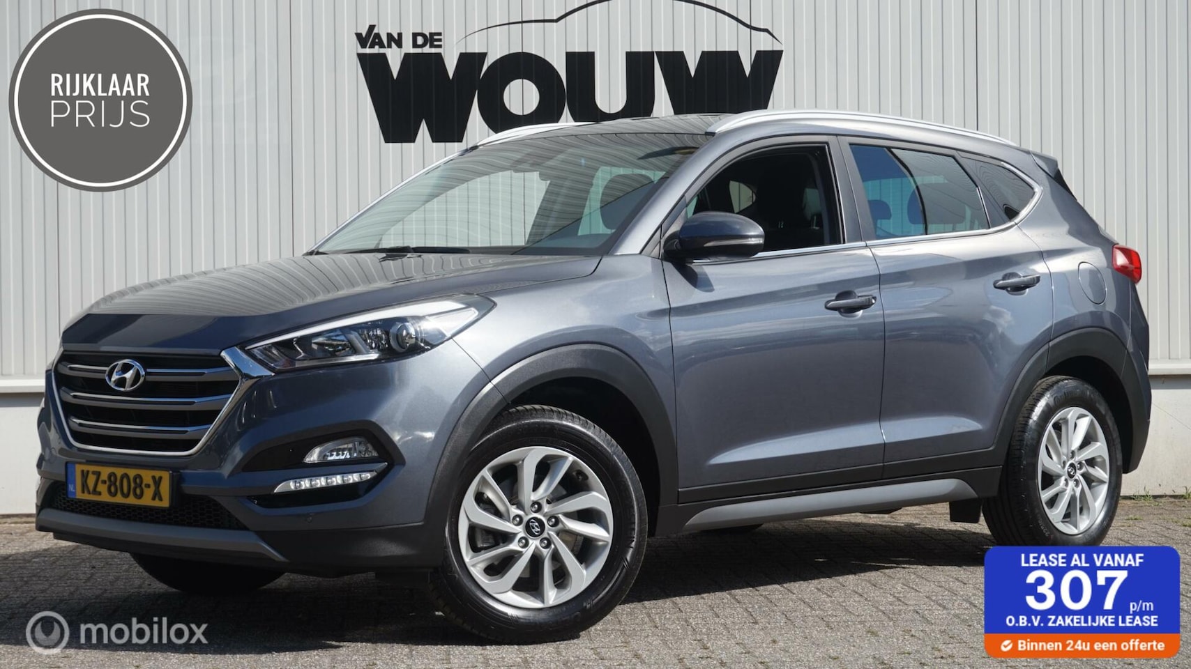 Hyundai Tucson - 1.6 GDi Go! Navi | Trekhaak | PDC V+A | Dealeronderhouden | Camera - AutoWereld.nl
