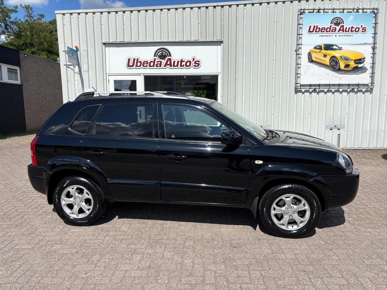 Hyundai Tucson - 2.0i Style Executive NL AUTO ZEER MOOI 4999E - AutoWereld.nl