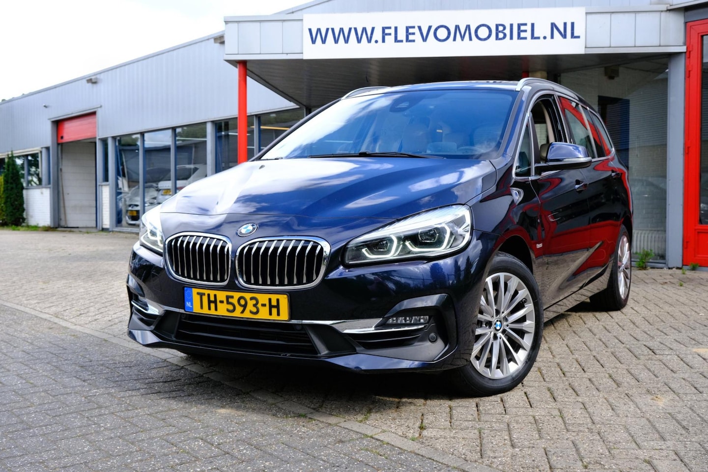 BMW 2-serie Gran Tourer - 218i High Executive Launch Edition 7-pers Aut. Pano|Leder|HUD|Navi|LMV - AutoWereld.nl