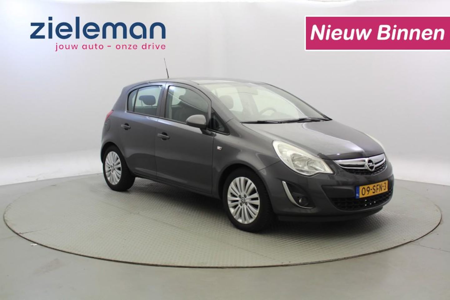 Opel Corsa - 1.4 16V Edition - Airco, Cruise, Navi - AutoWereld.nl